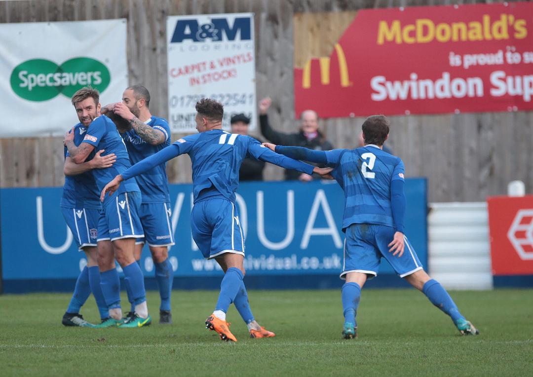 The players celebrate Ryan Campbell’s goal