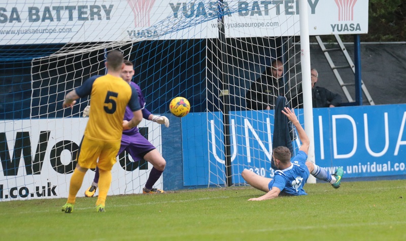 Harry Williams slides in but just sends his effort wide