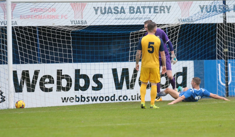 Harry Williams slides in but just sends his effort wide