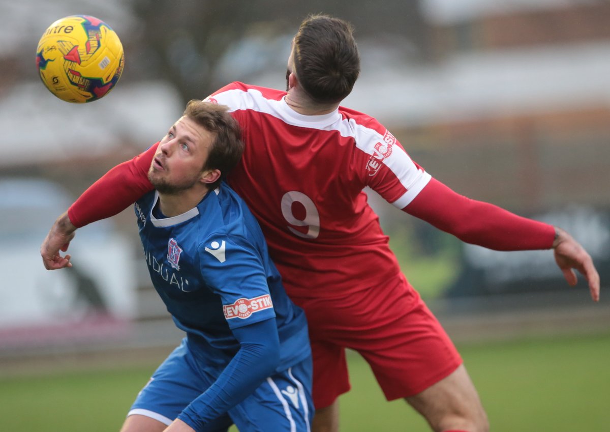 Connor Thompson in a challenge for the ball