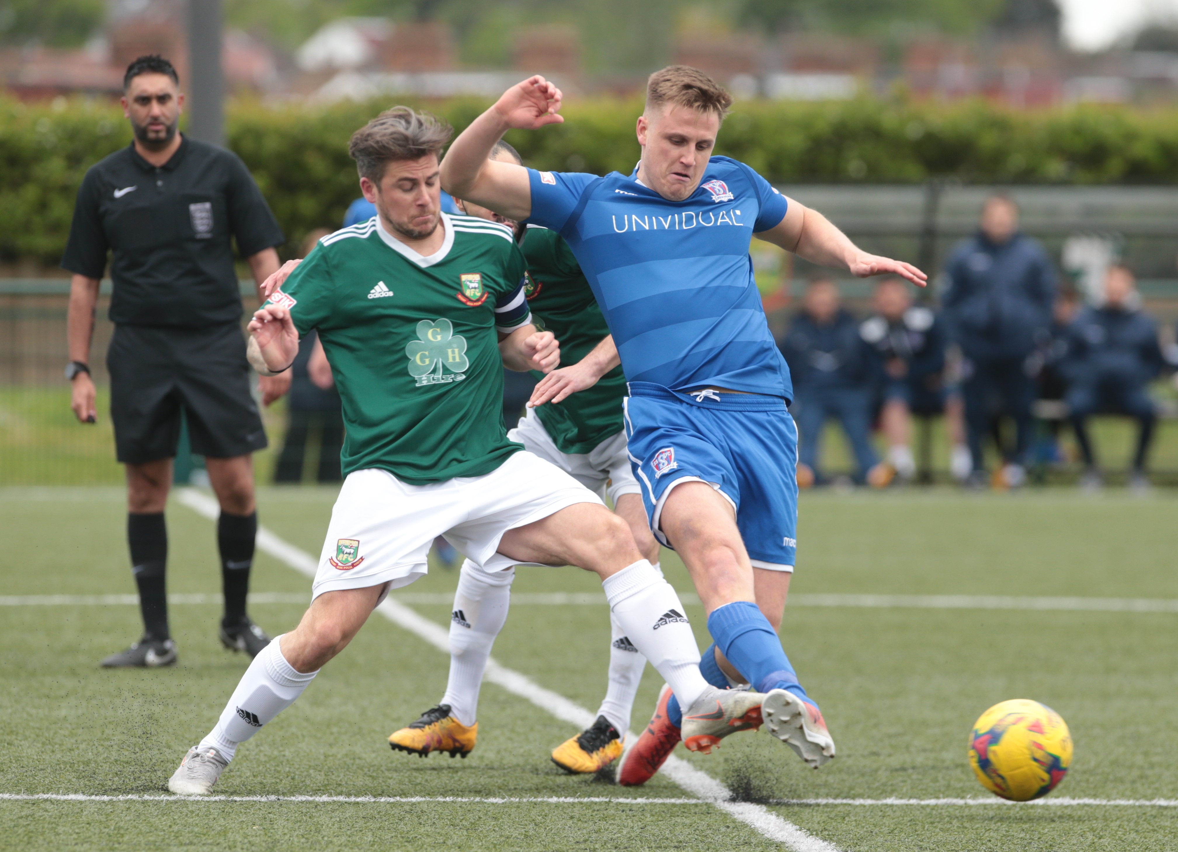 Calvin Dinsley wins the ball from Hendon skipper Lee Chappell