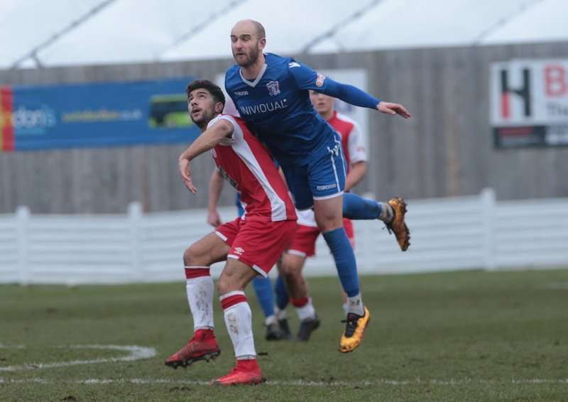 Jamie Edge challenges for the ball