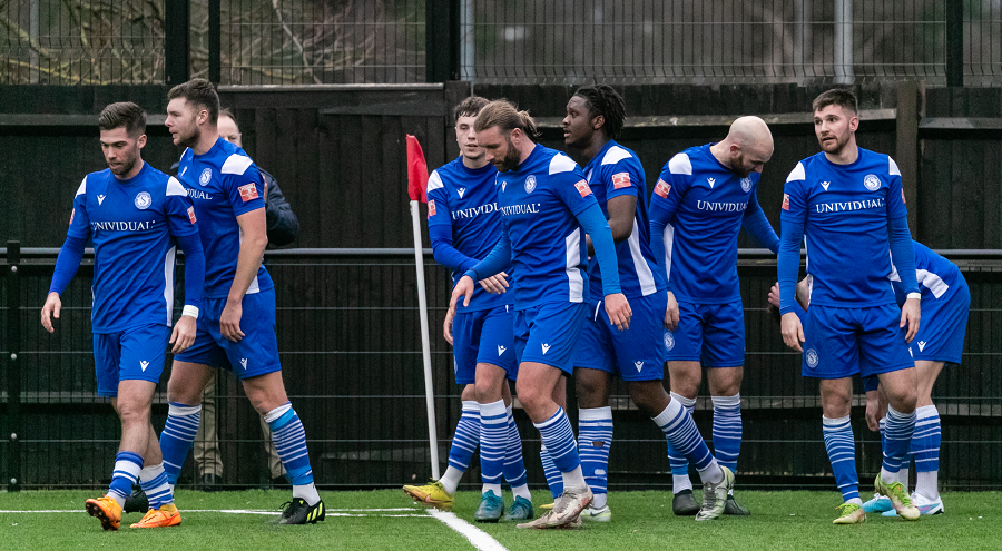 The players celebrate James Harding’s 88th minute winner