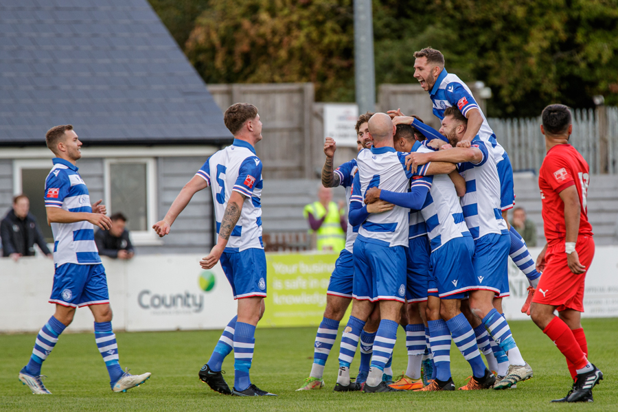 The players celebrate Brad’s goal