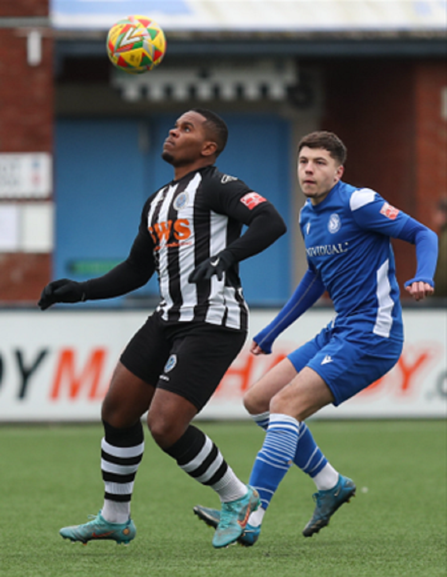 Shortly after challenging Jordan Ngalo Henry Spalding scored Marine’s third goal