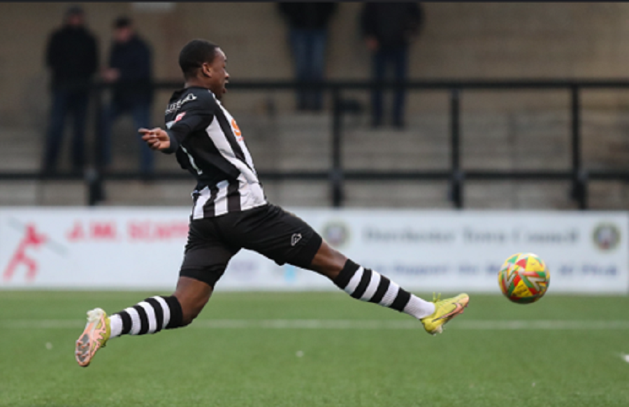 Shaquille Gwengwe stretches to score Dorchester’s equalising goal