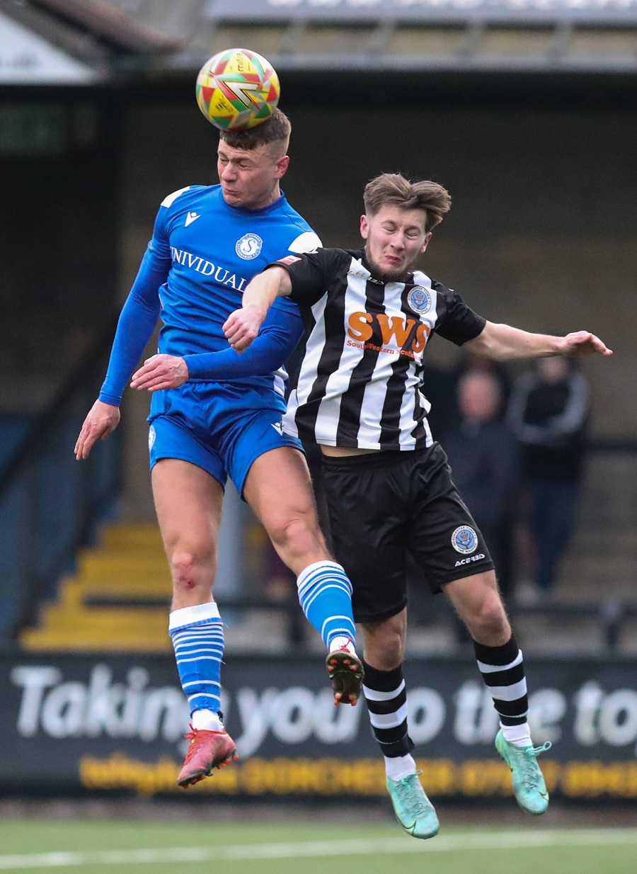 Will Tunnicliff in a challenge with Dorchester’s Alfie Stanley