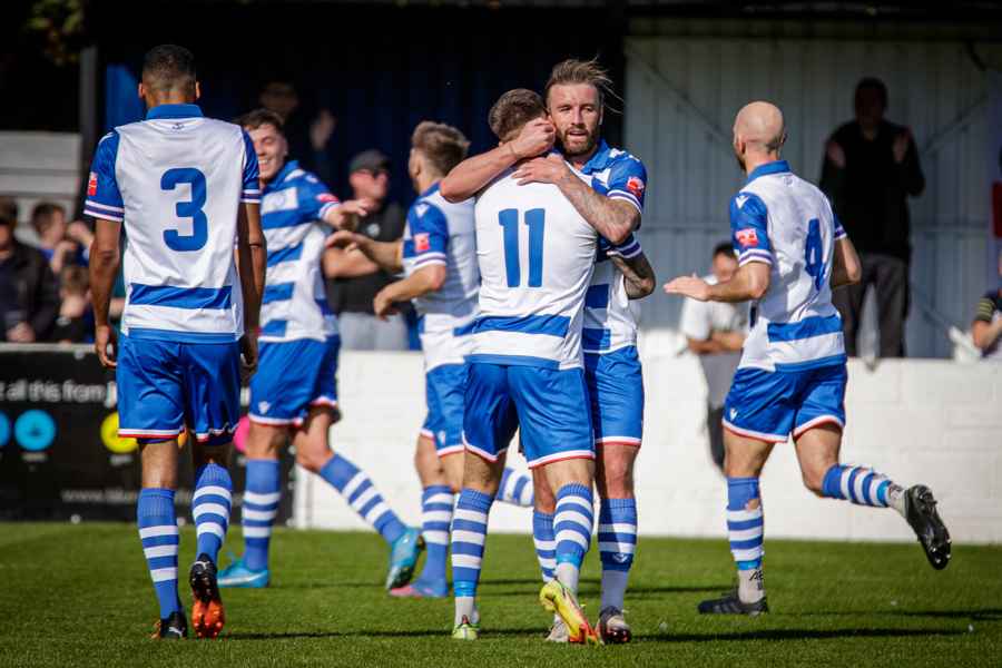 The players celebrate Henry’s goal