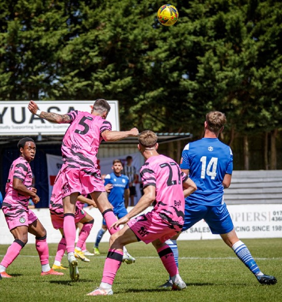 Leon Morrison was quickly into the action as he heads clear with a number of Rovers players looking on