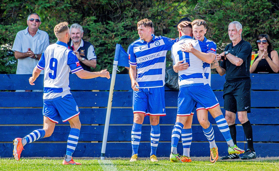 James Harding scores Marine’s second goal and celebrates