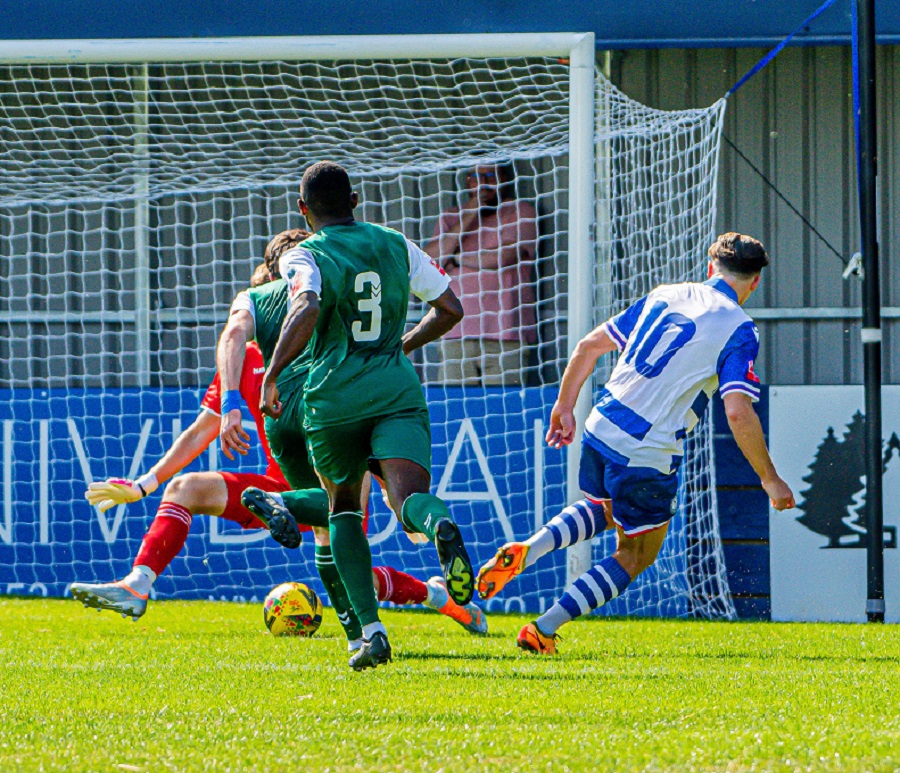 James Harding scores Marine’s second goal and celebrates