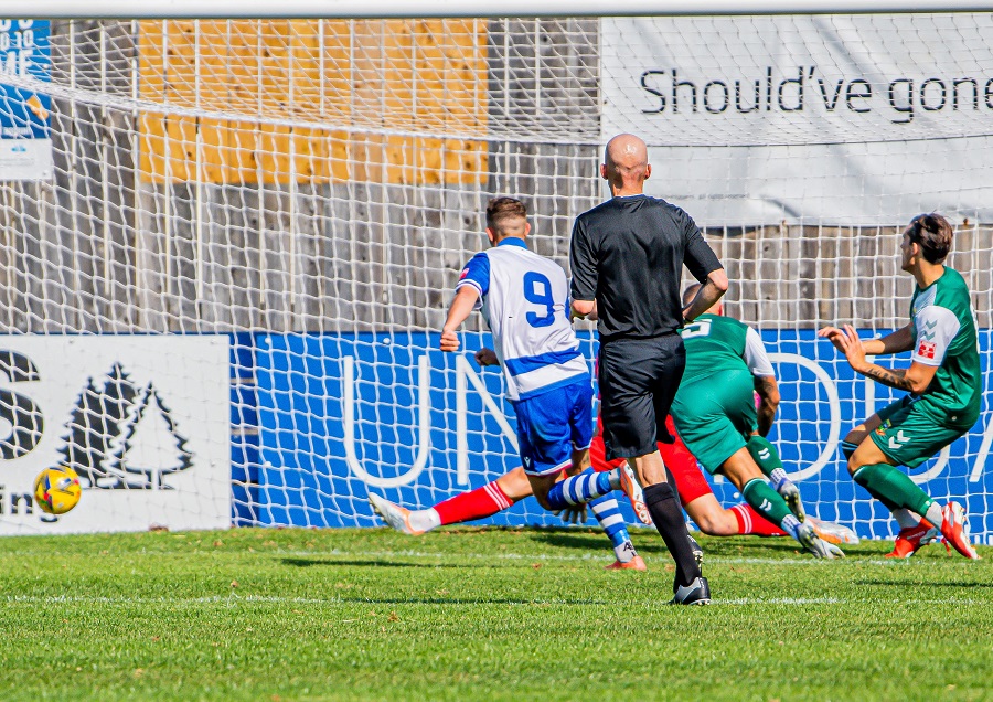 Harry scores Marine’s third goal after a great run and pass by Tyrone Duffus