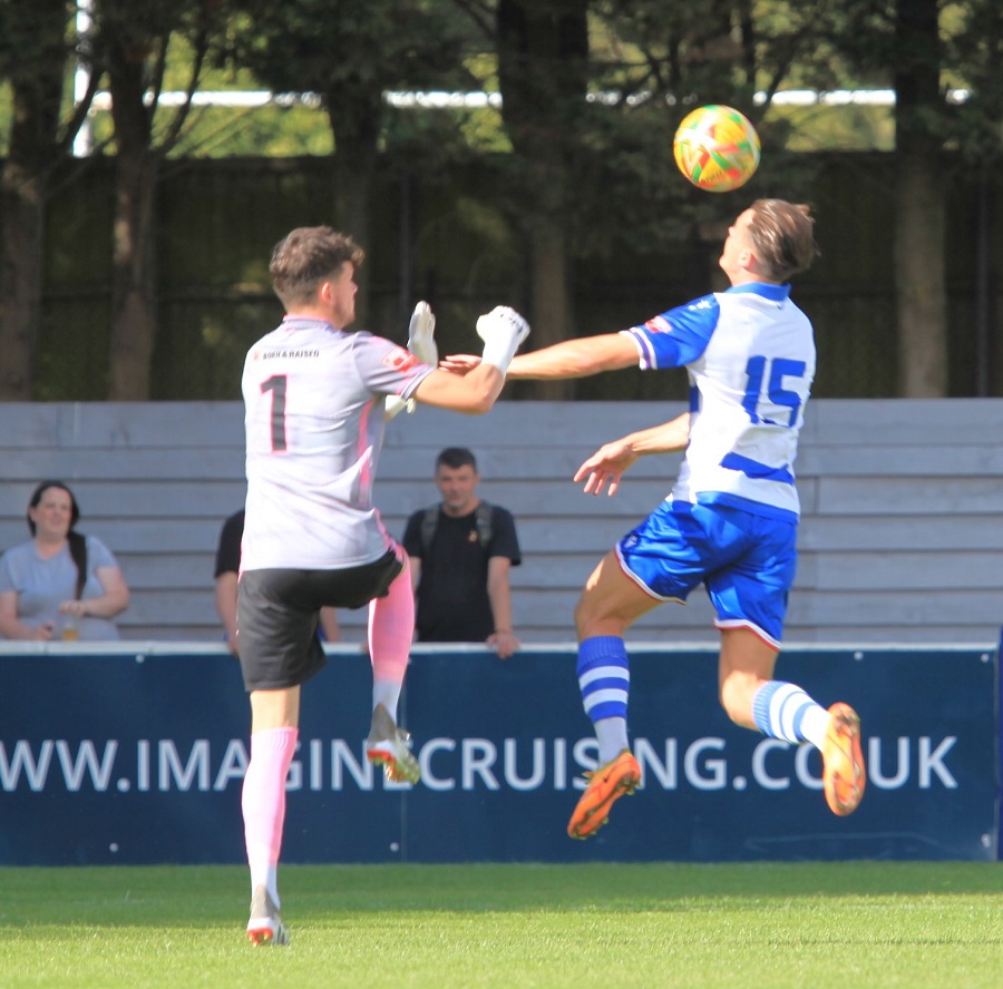 James Harding is fouled by the Met Police keeper but the referee had already blown for offside