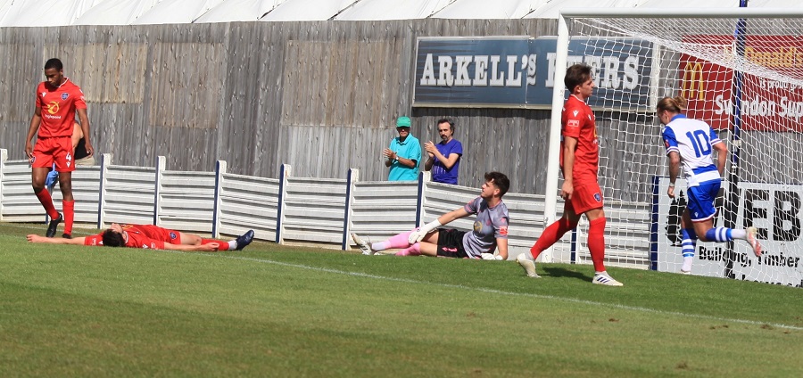 Met Police’s Harry Taylor lays prone after scoring the opening own goal