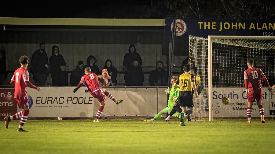 Harry Williams slots the ball home for the first Marine equaliser
