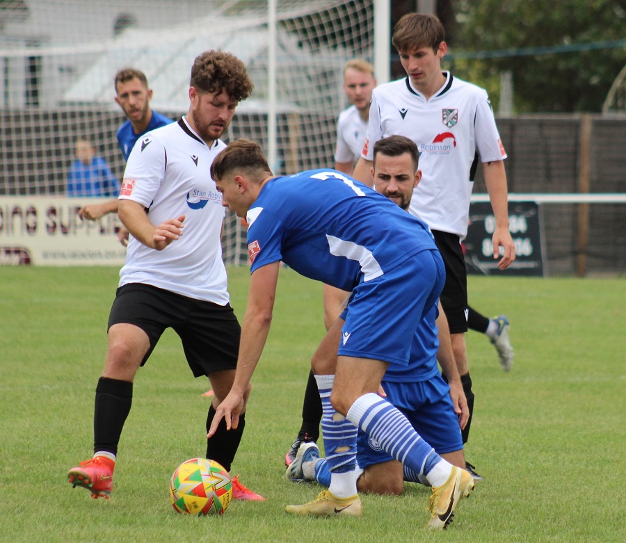 Henry Spalding attempts to take a quick free kick