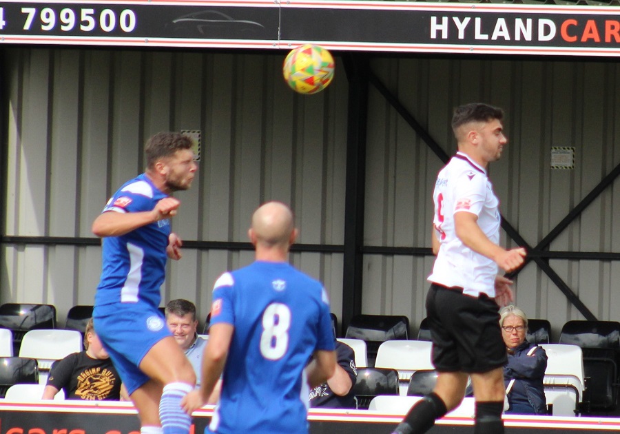 Mat Liddiard wins the header