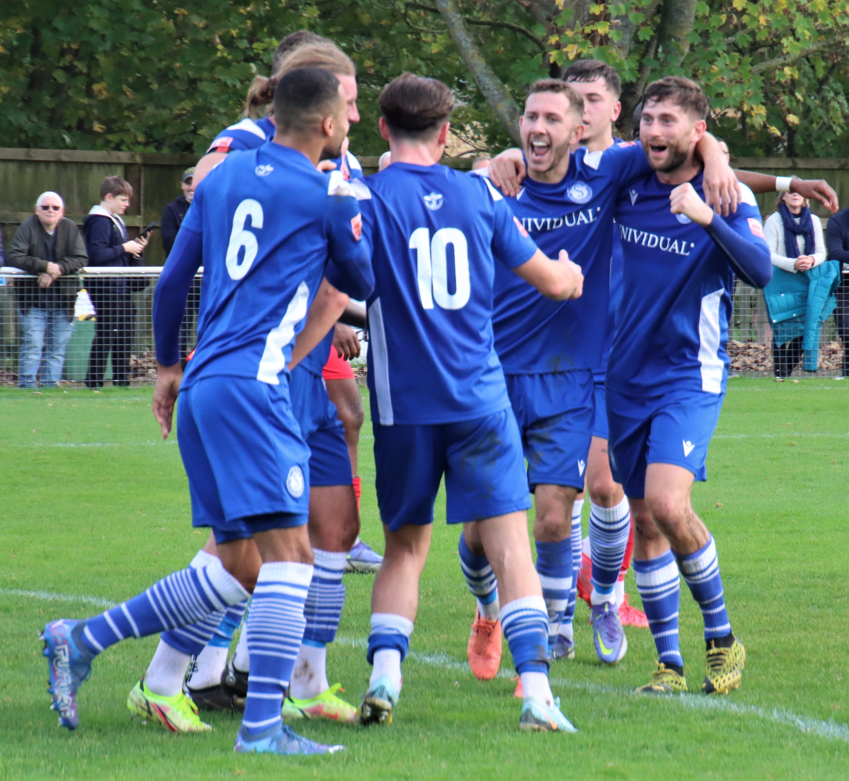 The players celebrate Conor’s goal