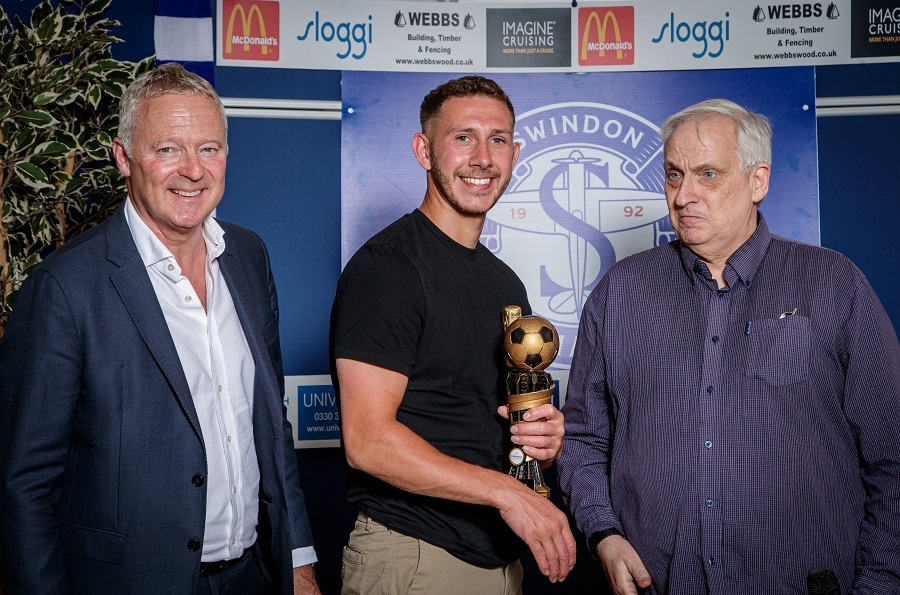 Pete Crockett presents Harry Williams with the Supporters Player of the Season