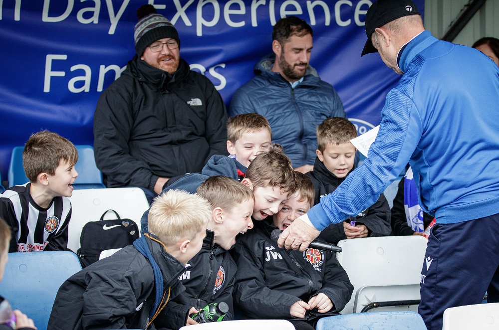Some of the Carterton U8s enjoying their matchday experience