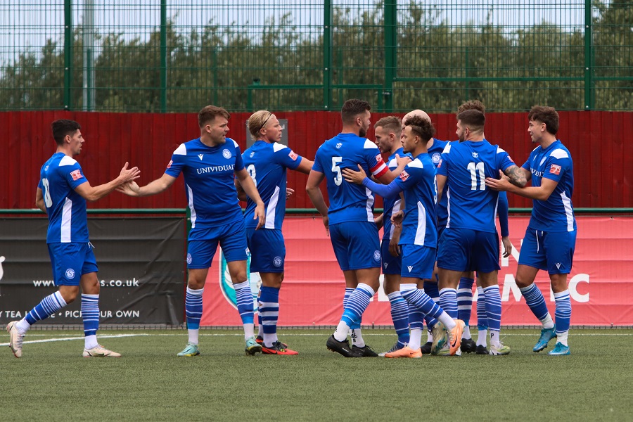 The players celebrate our second goal by Ed Williams on Saturday at Walton & Hersham