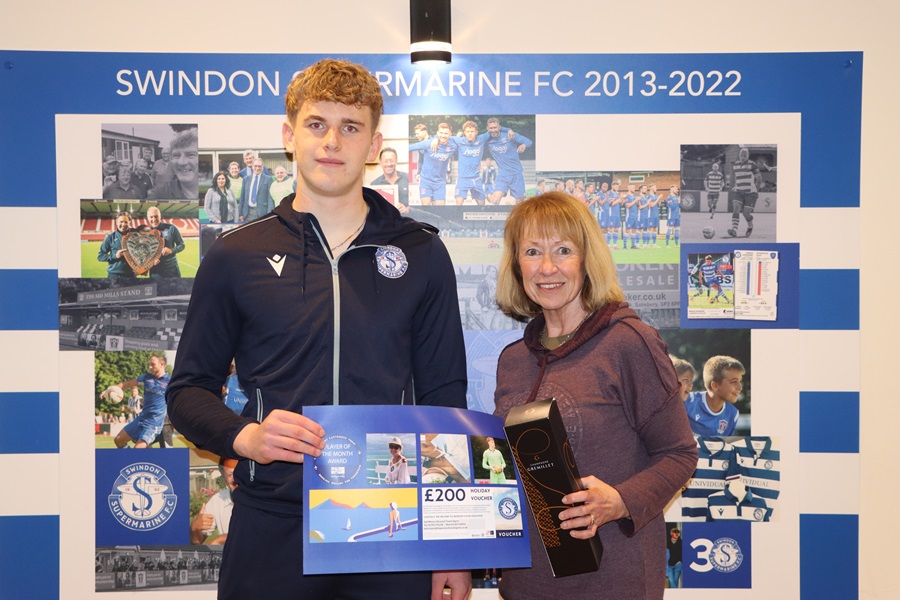 Fiachra Pagel receives his POM award from Judi Moore