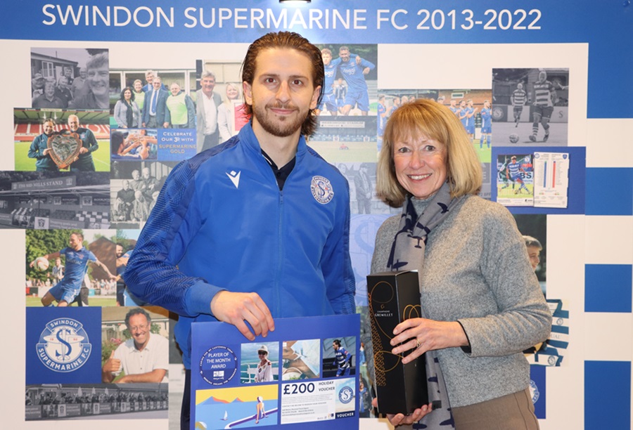 Dave Sims-Burgess receives his POM award from Judi Moore