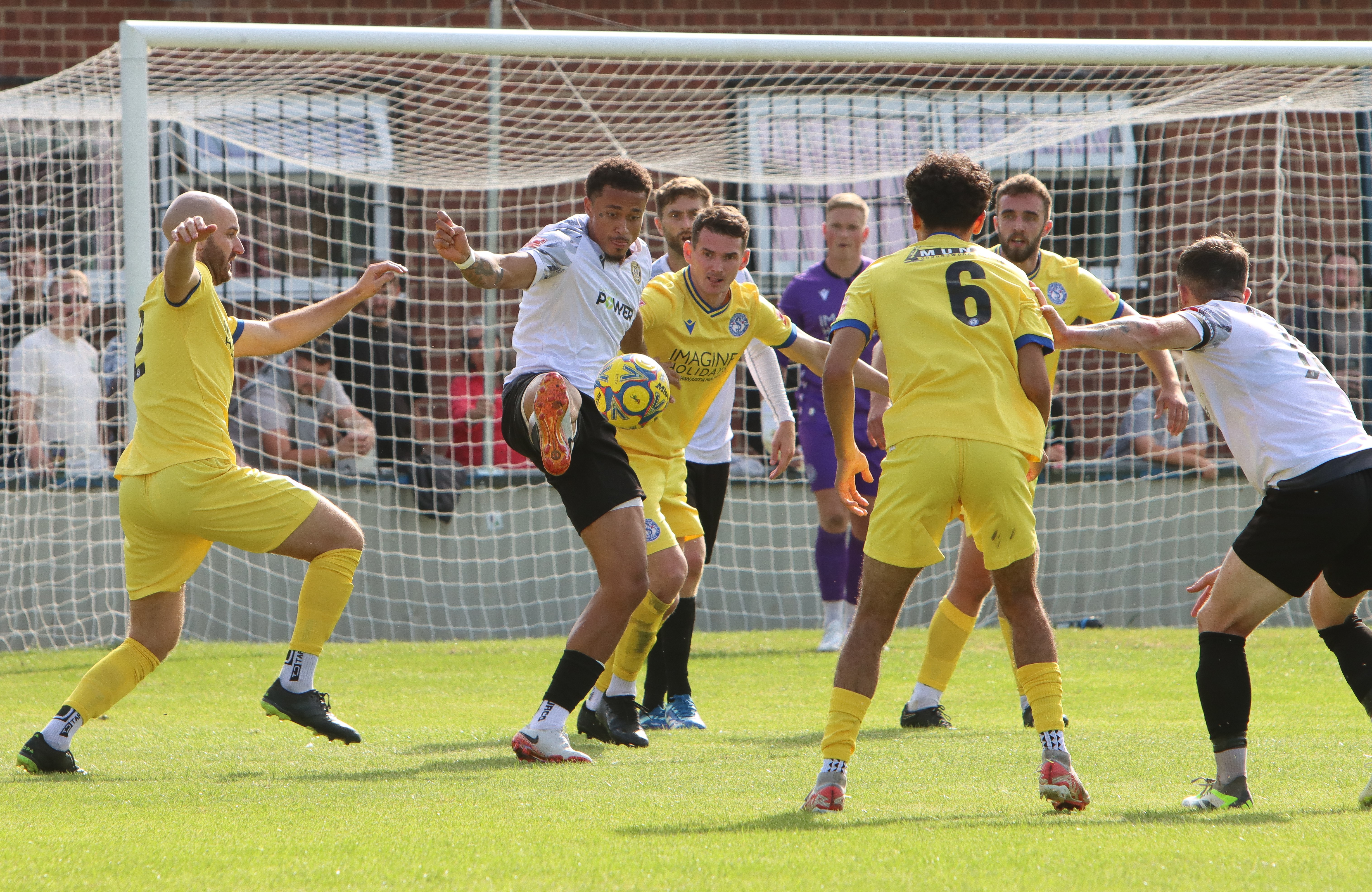 The Marine players defend their lead in the final minutes