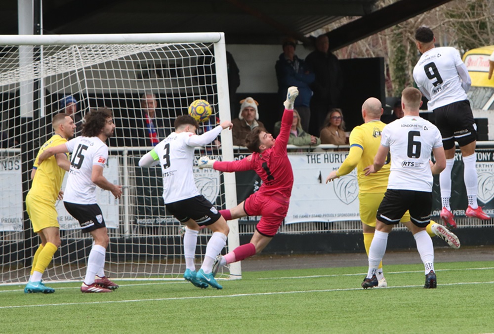 A Marine corner flashed across the goal with Merthyr keeper Jamie Cogman struggling to get the cross