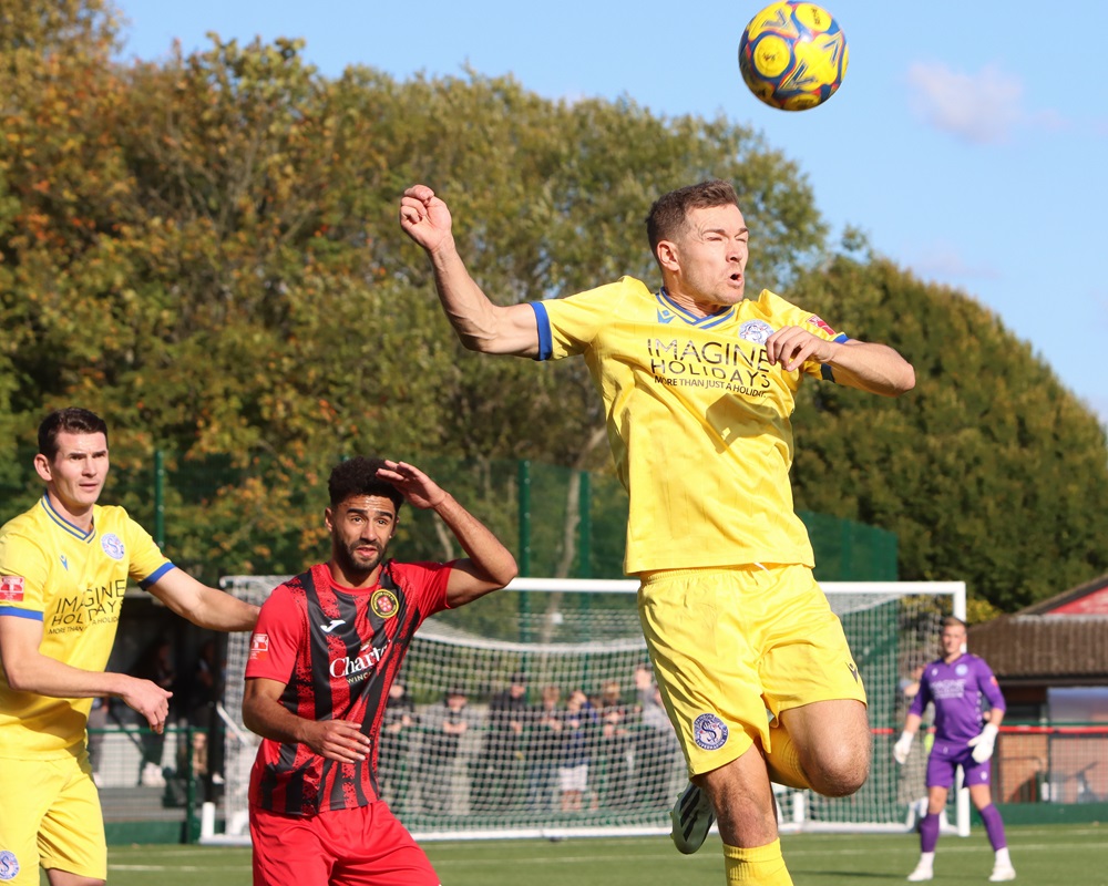 Sam Turl had a busy afternoon marking one of Winchester goalscorers Ik Hill