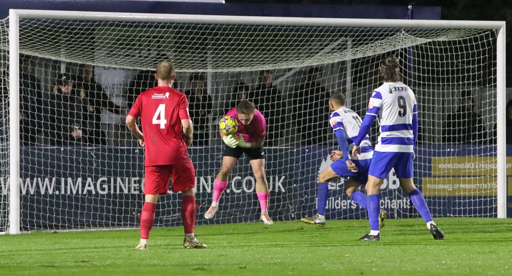 Winchester keeper Luke Cairney spills a Fernandes free kick and Harry Williams toe pokes the ball home