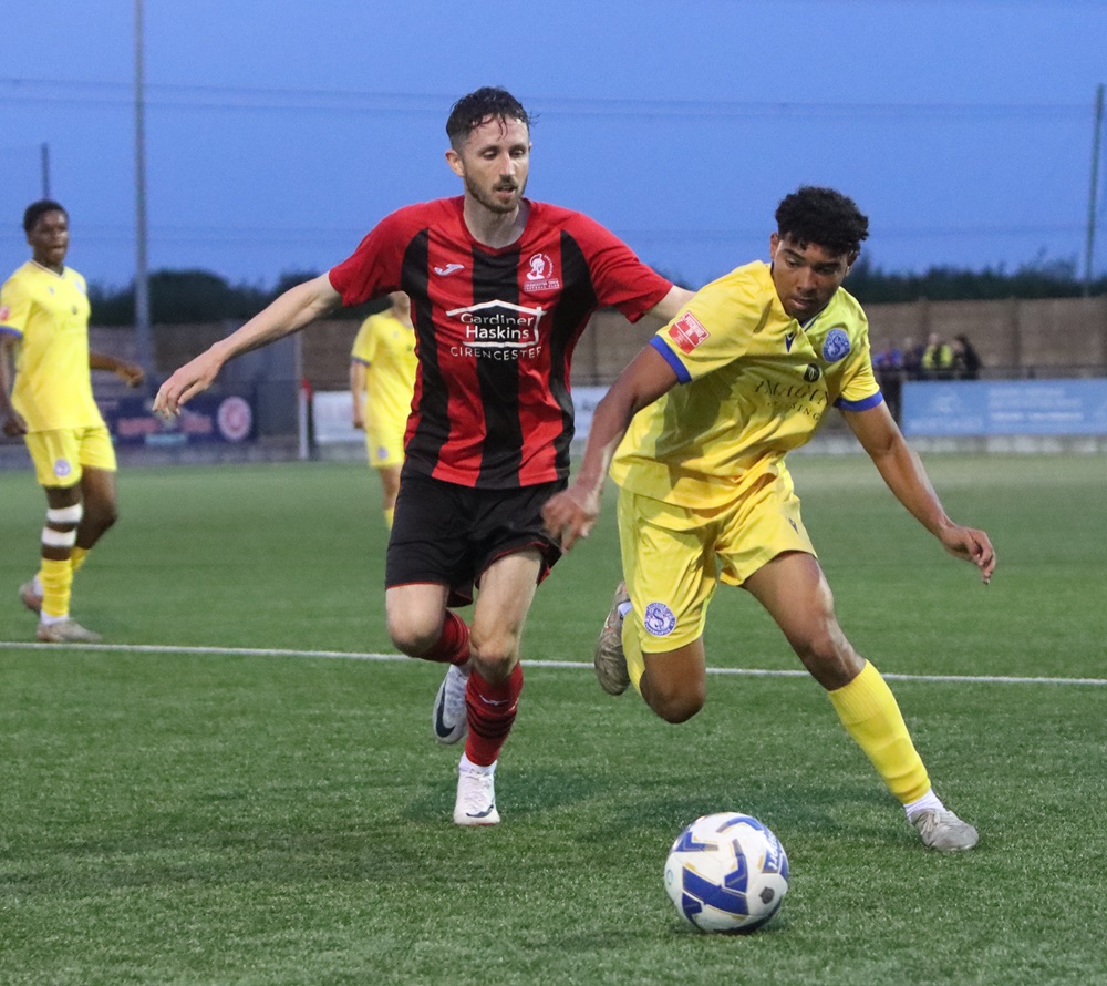 Cheldon Valere challenges Cirencester’s goalscorer Harlie Price