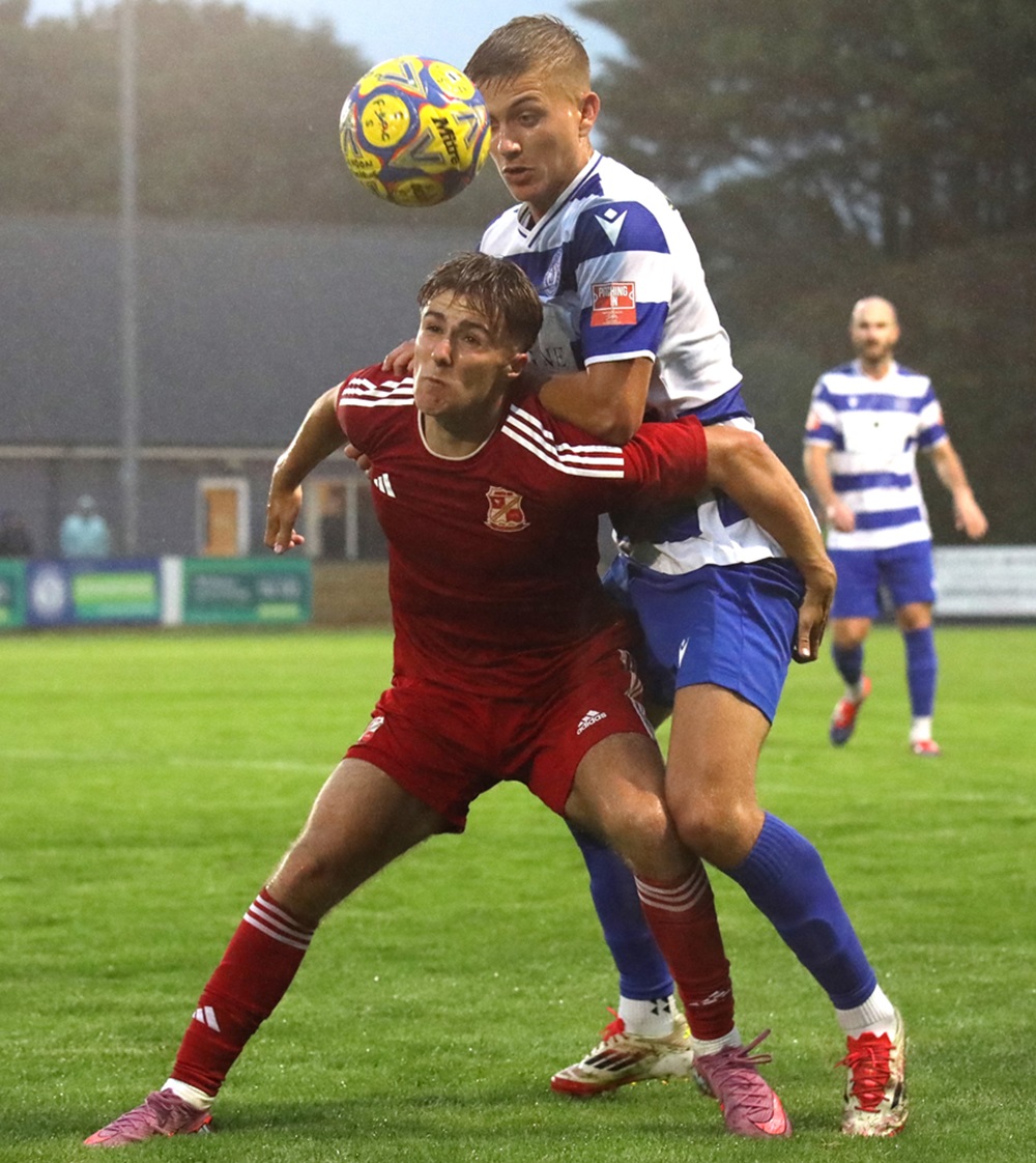 Piotr Petrynski wins the header