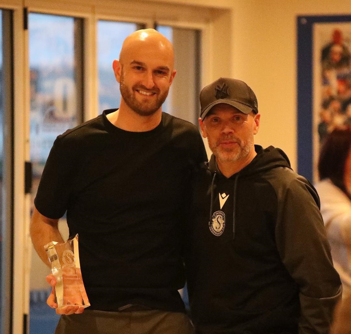Jamie Edge receiving the Manager’s Player of the Year award from Bobby Wilkinson