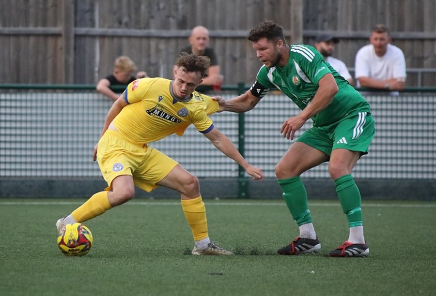 Dan Warre gets a tug from Matt Liddiard