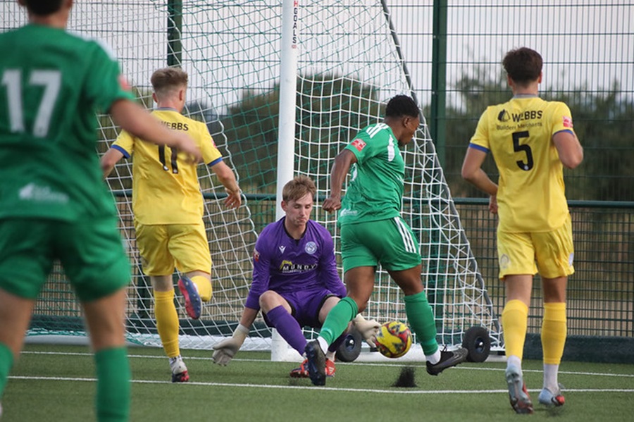 Marine keeper Joel Halliday makes an early save