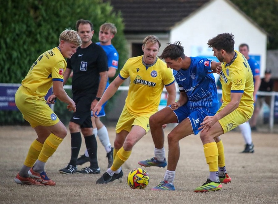 Our trio of midfield players were always closing down the Slimbridge players