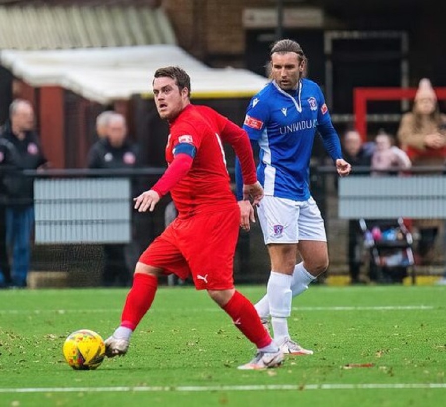 Conor McDonagh looks on as the influential Scott Donnelly plays the ball