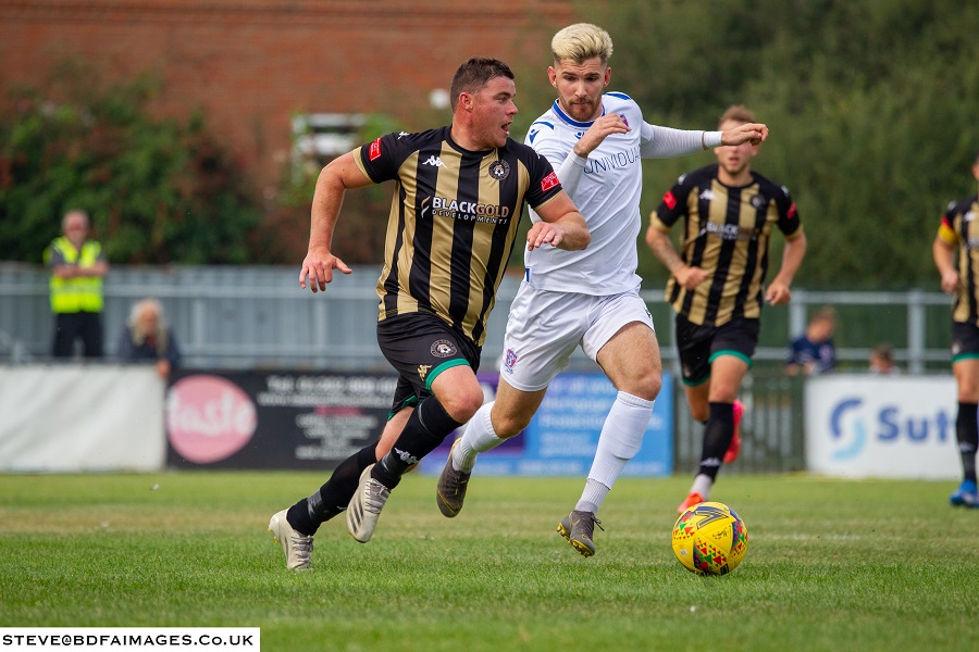 Zack Kotwica chases Luke Burbidge who scored Poole’s third goal