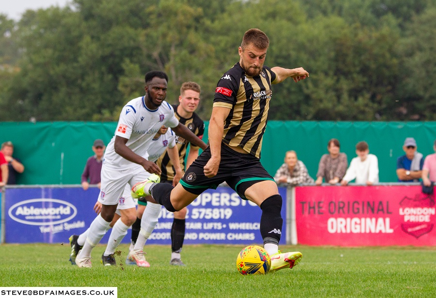 Tony Lee takes the penalty to score Poole’s second goal