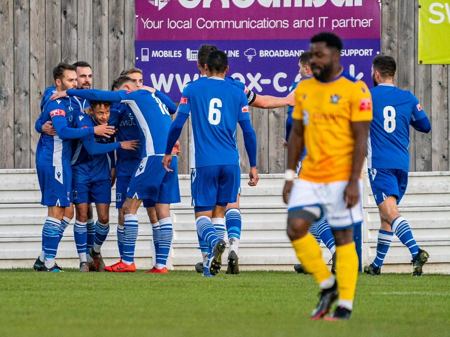 The players celebrate Campbell’s opening goal