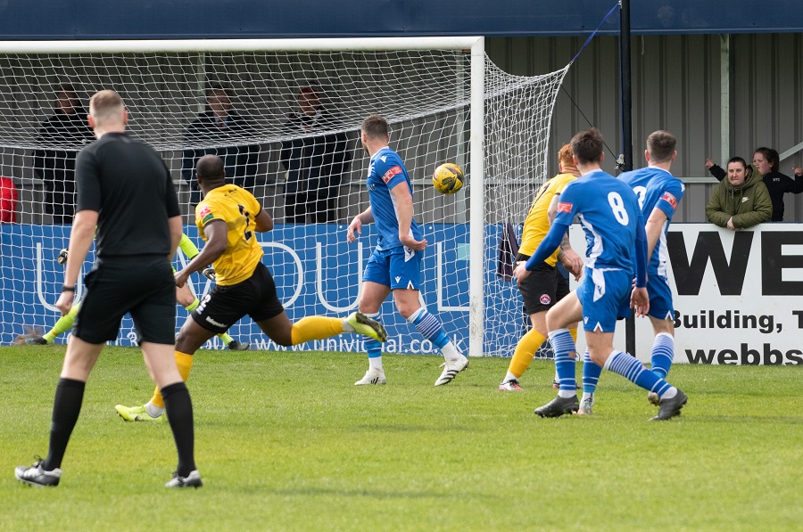 Nial Thompson’s shot takes a deflection of Tom Sharpe (8) for Truro’s goal