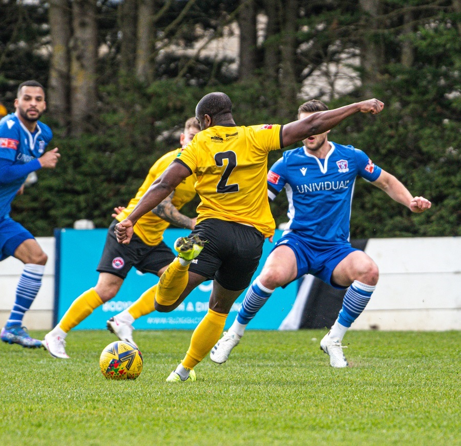 Truro’s Nial Thompson shoots for goal but Martin Horsell pushes the ball past the post