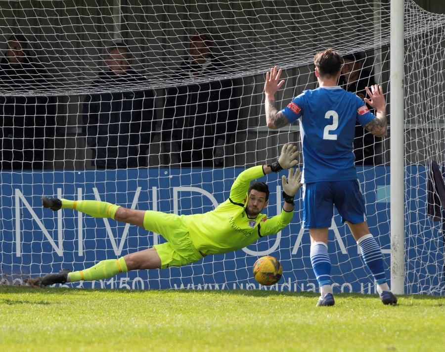 Martin Horsell makes a good save from Rio Garside