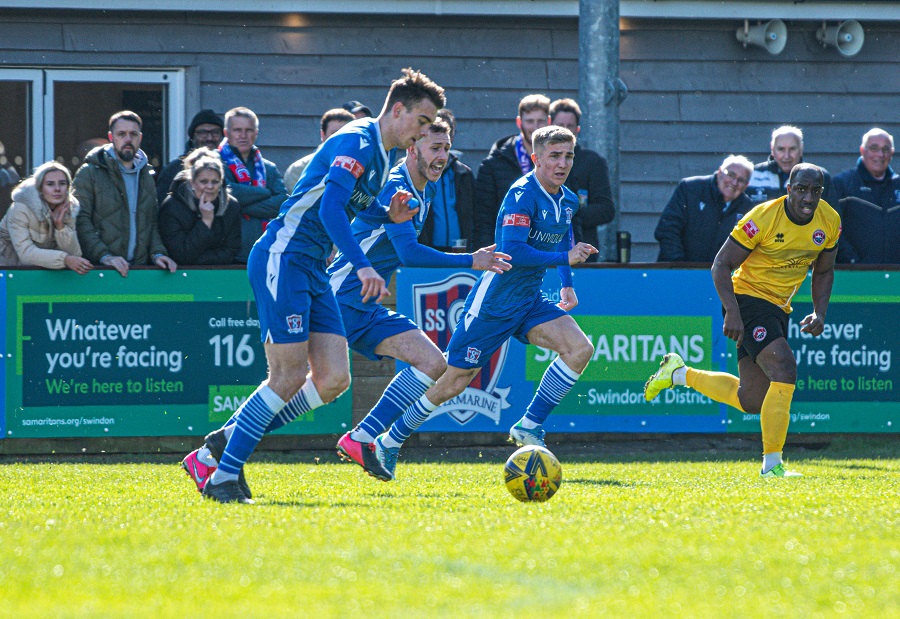 Tom Sharpe strides on to take a shot at the Truro goal