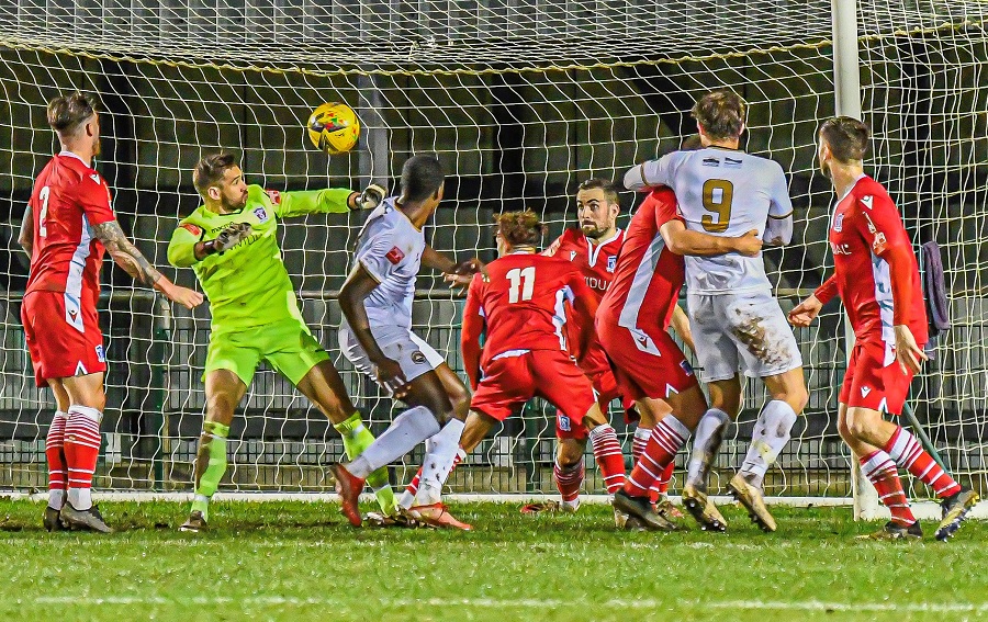 A goalmouth scramble just before half time and Lewis Hall clears off the line