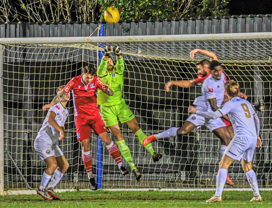 Martin Horsell clears away one of many crosses into the box by Truro