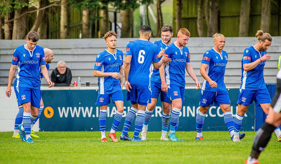 The players celebrate Campbell’s goal