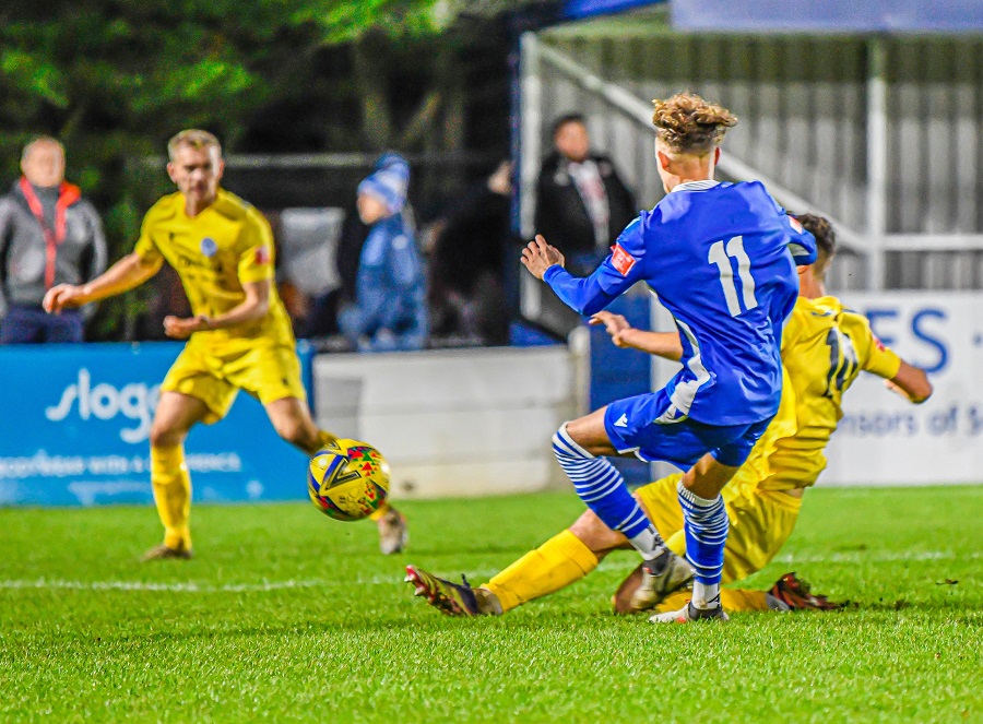 Ryan Campbell is tackled by the Yate defender