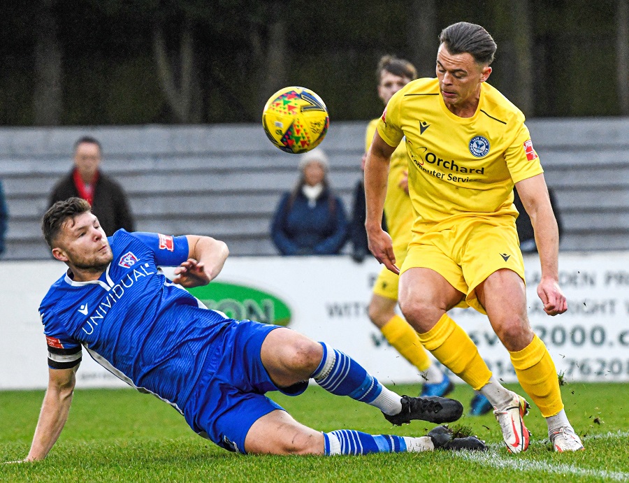 The lively James Harding is tackled by Mat Liddiard